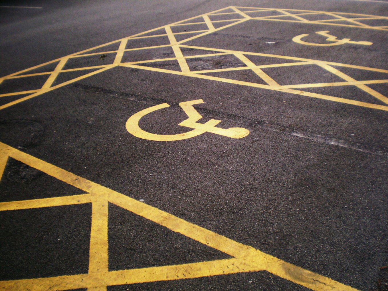 Accessible parking spaces marked with wheelchair symbols