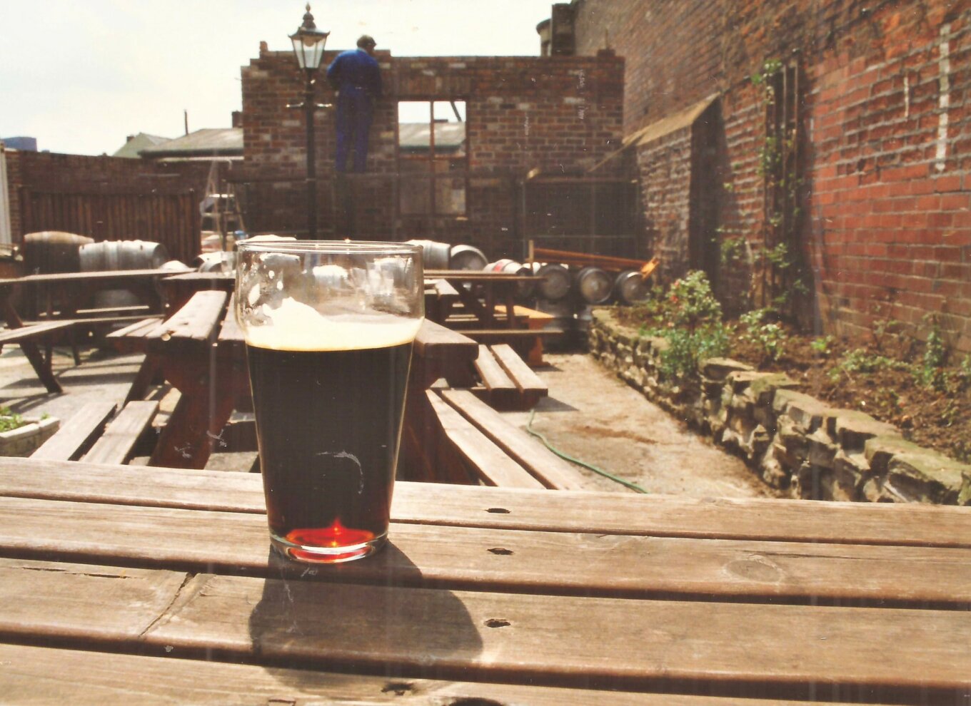A pint of beer outside Kelham Island Brewery mid-construction