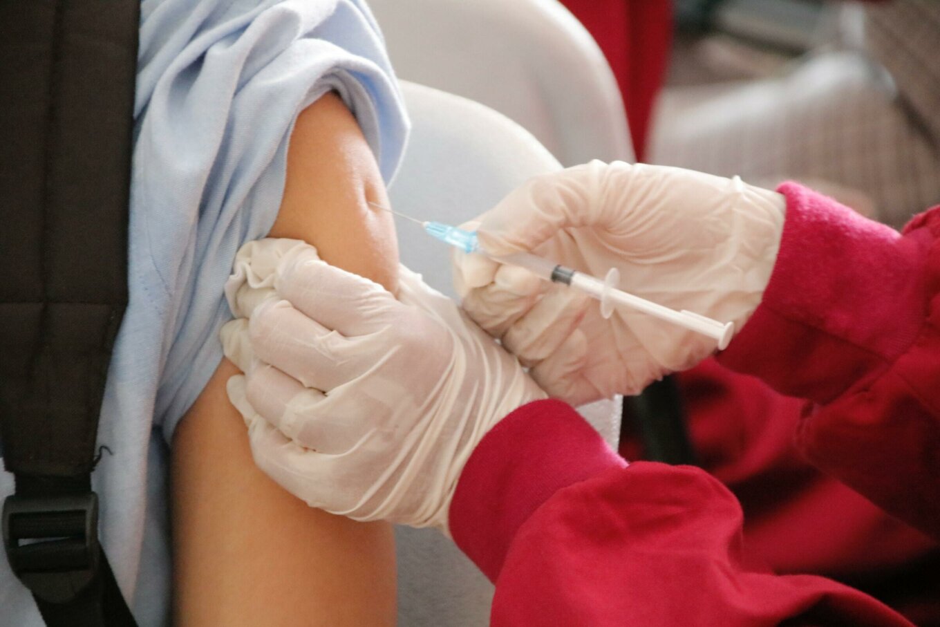 A person receives a vaccine