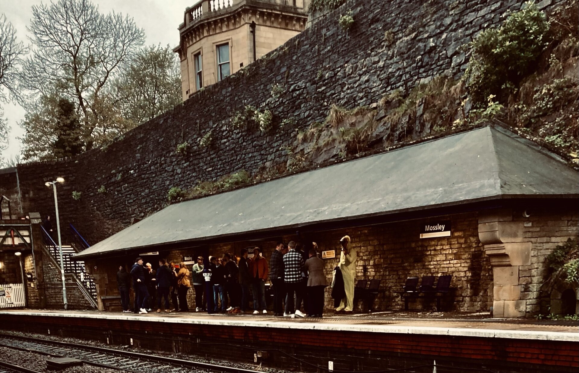 Football fans at Mossley Station