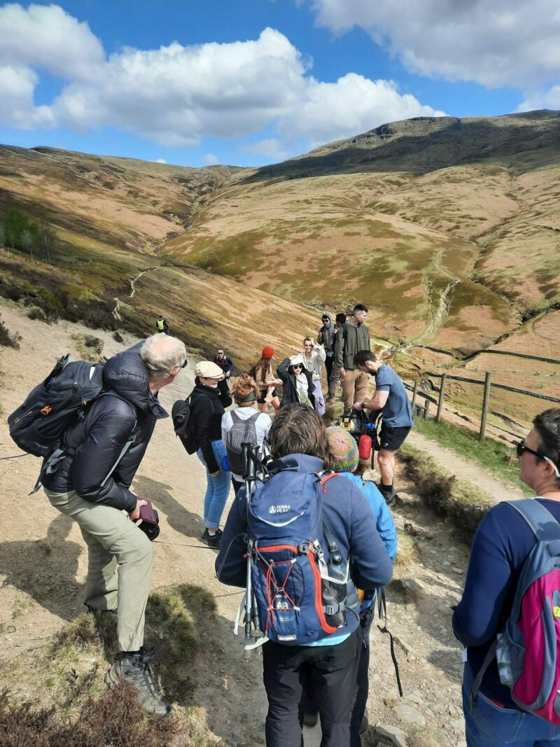 Group members following the trail towards William Clough