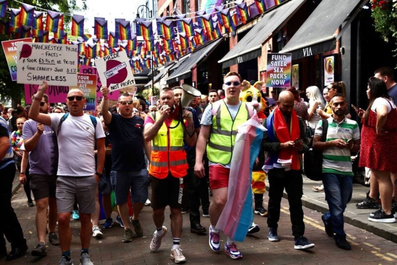 John Proctor (centre, with megaphone) leads around 1,500 people who attended the Pride protest march in July 2021